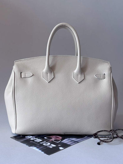 Světle béžová designová kožená kabelka od Zoibag zadní strana.