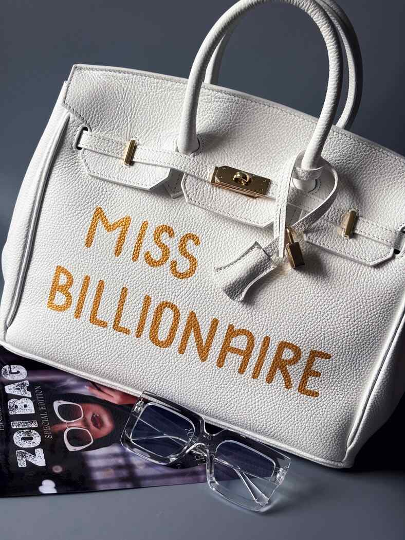 Shopper bílá kožená kabelka Zoi Bag s nápisem "Miss Billionaire"