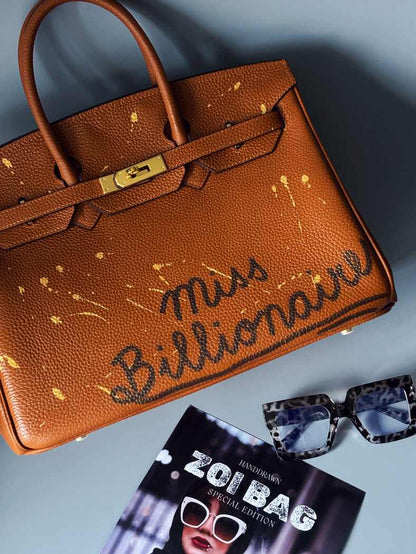 Designová kožená hnědá kabelka Zoi Bag s nápisem "Miss Billionaire"